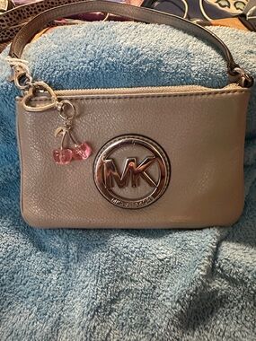 Michael Kors Gray Pebbled Leather Wristlet with MK Medallion